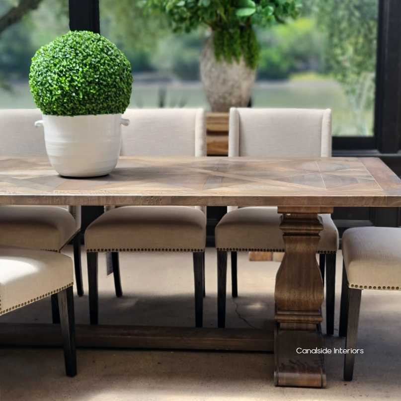 Angled perspective of the dining table, emphasising its timeless trestle base and the sophistication it adds to any dining space.