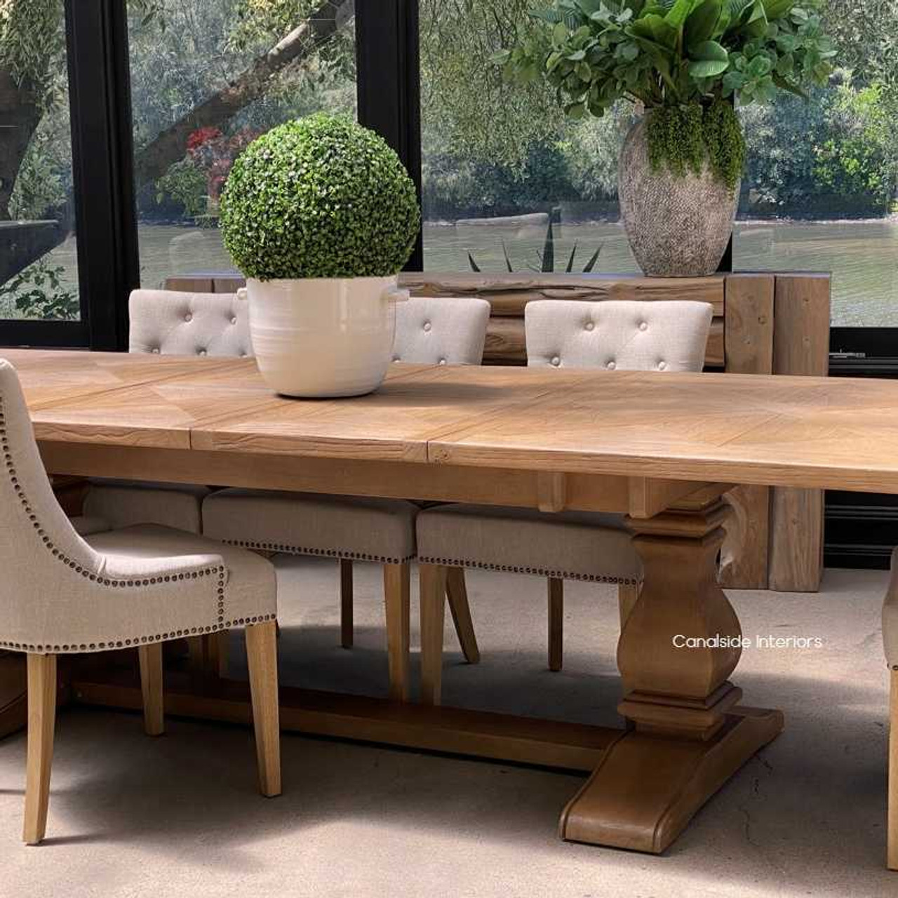 The dining table in a Hamptons-inspired dining room, proving its adaptability and seamless fit with various interior decor styles.