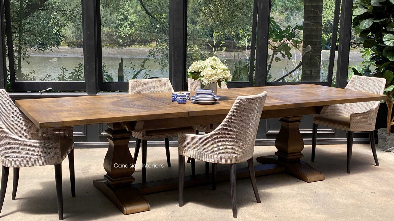 The table fully extended, ready to host a grand feast, demonstrating its versatility and spacious dining surface.