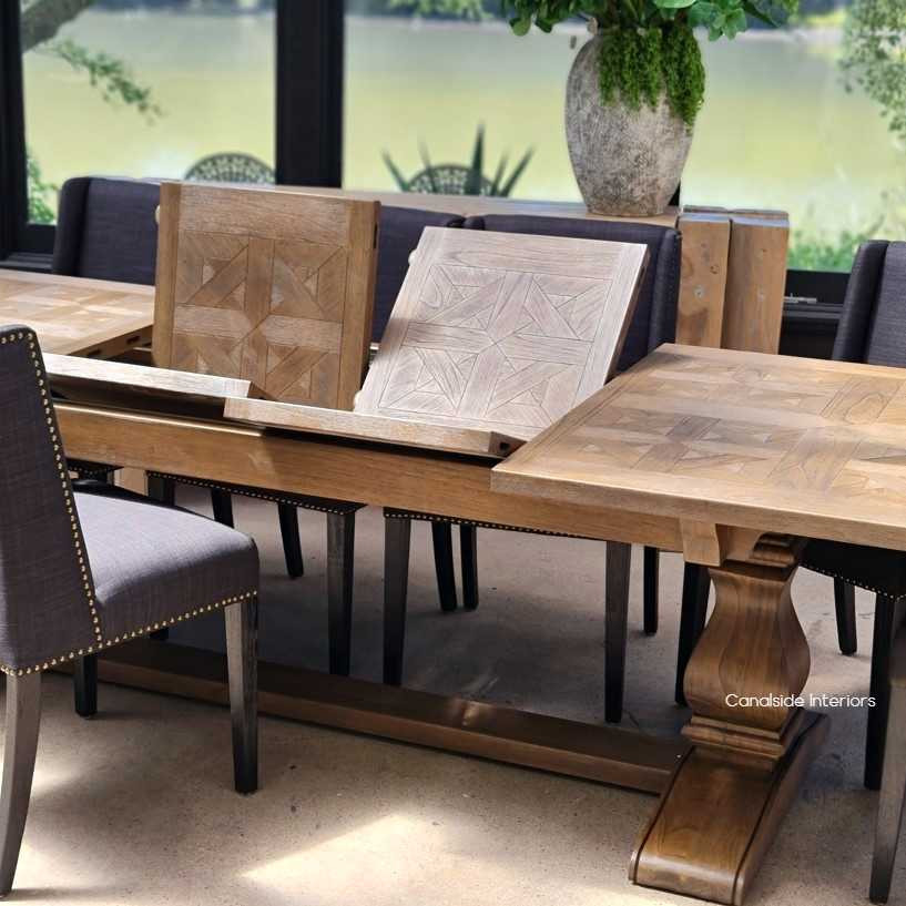 View of the table’s smooth extension process, showcasing the ease with which it can accommodate extra guests.