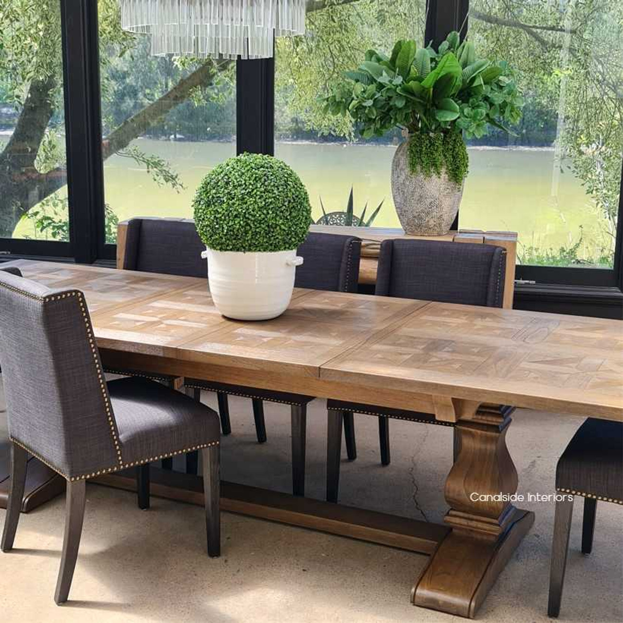 Lifestyle image depicting a cozy family meal setup, demonstrating the table’s functionality for intimate dining experiences.