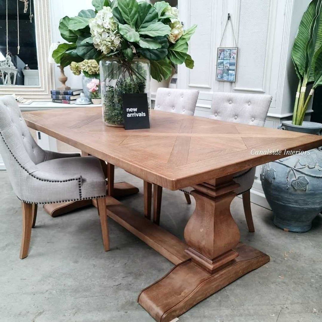 View of the Hampton Bay Parquetry Dining Table, featuring the intricate hand-crafted parquetry top and solid fruitwood pedestal base, perfect for Hamptons-style interiors.