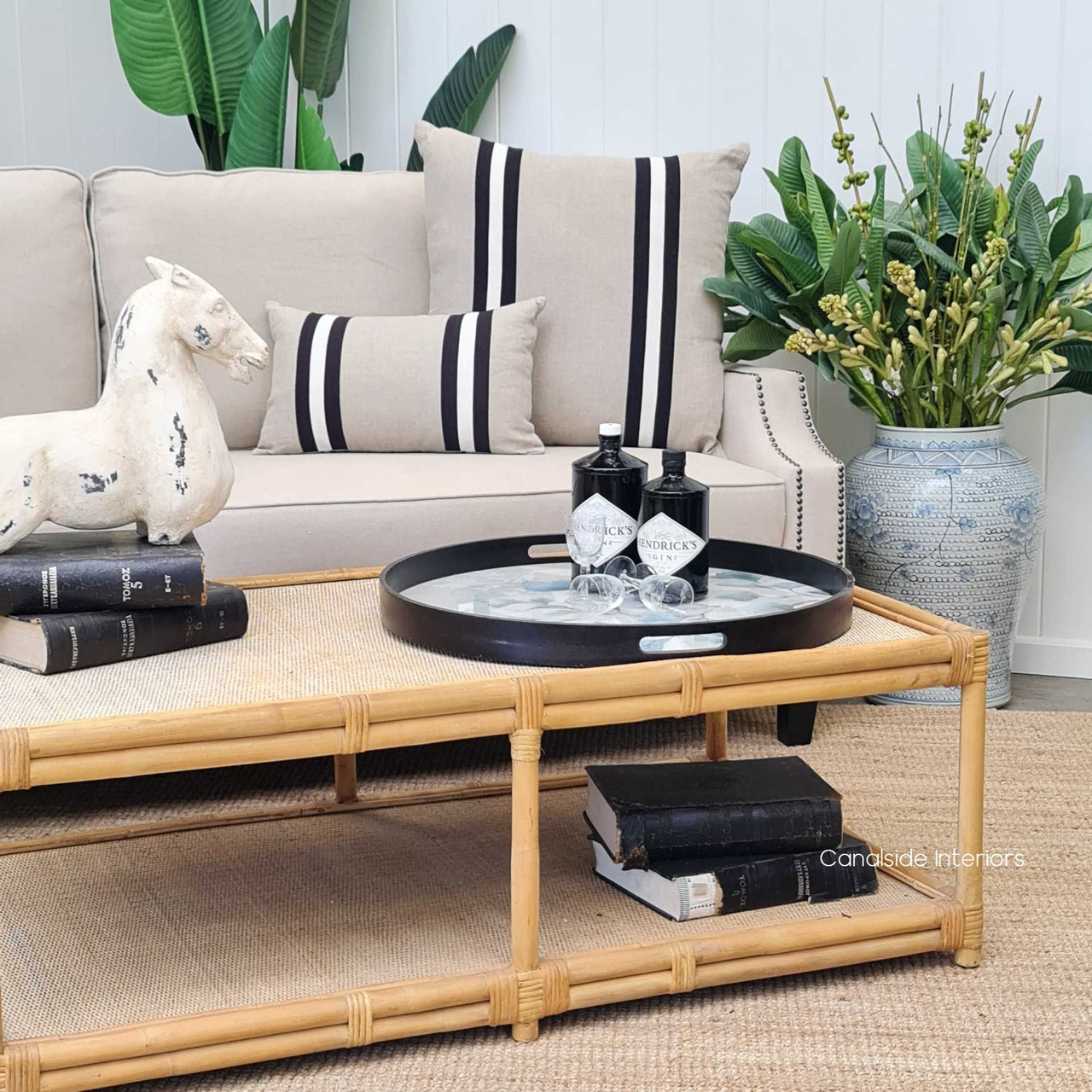 The Raffles Coffee Table's classic lines and natural textures make it an effortless statement piece for a chic, Hamptons-inspired lounge room