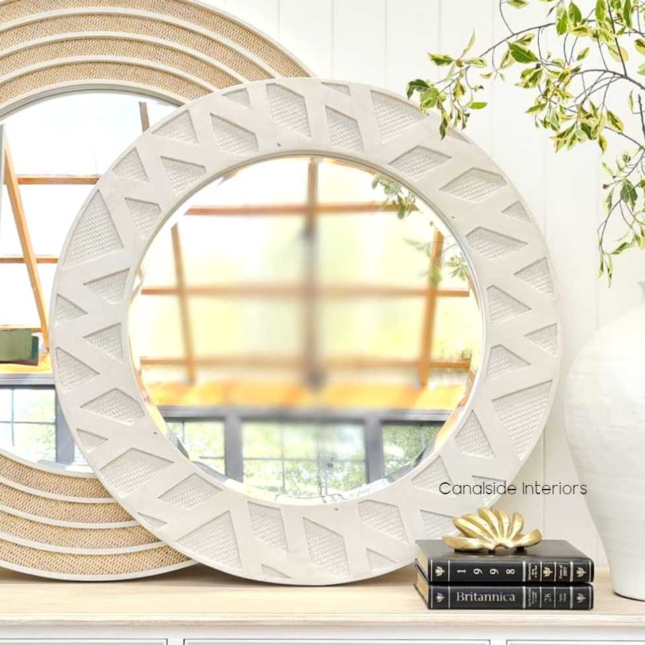 Close-up of the Botanica mirror's rattan detailing under natural lighting, accentuating the texture and inviting warmth.
