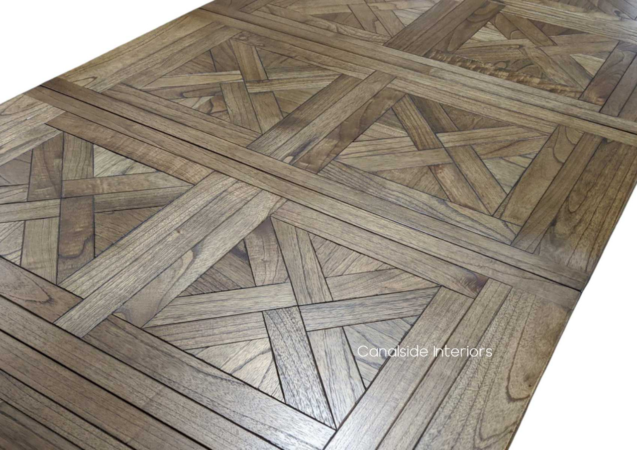 Hamptons-inspired Stamford dining table with smooth finish, perfect for creating memorable feasts in a classical dining room setting