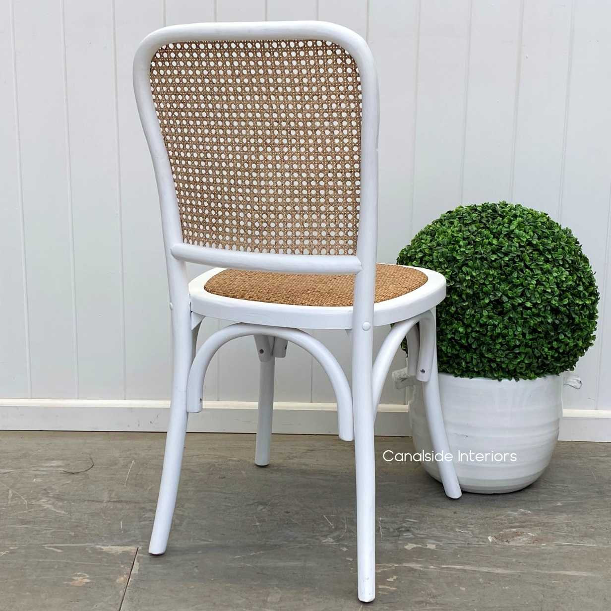 Canalside Interiors presents the Saxon Chair: a symbol of quality and style in distressed white, perfect for any bedroom setting