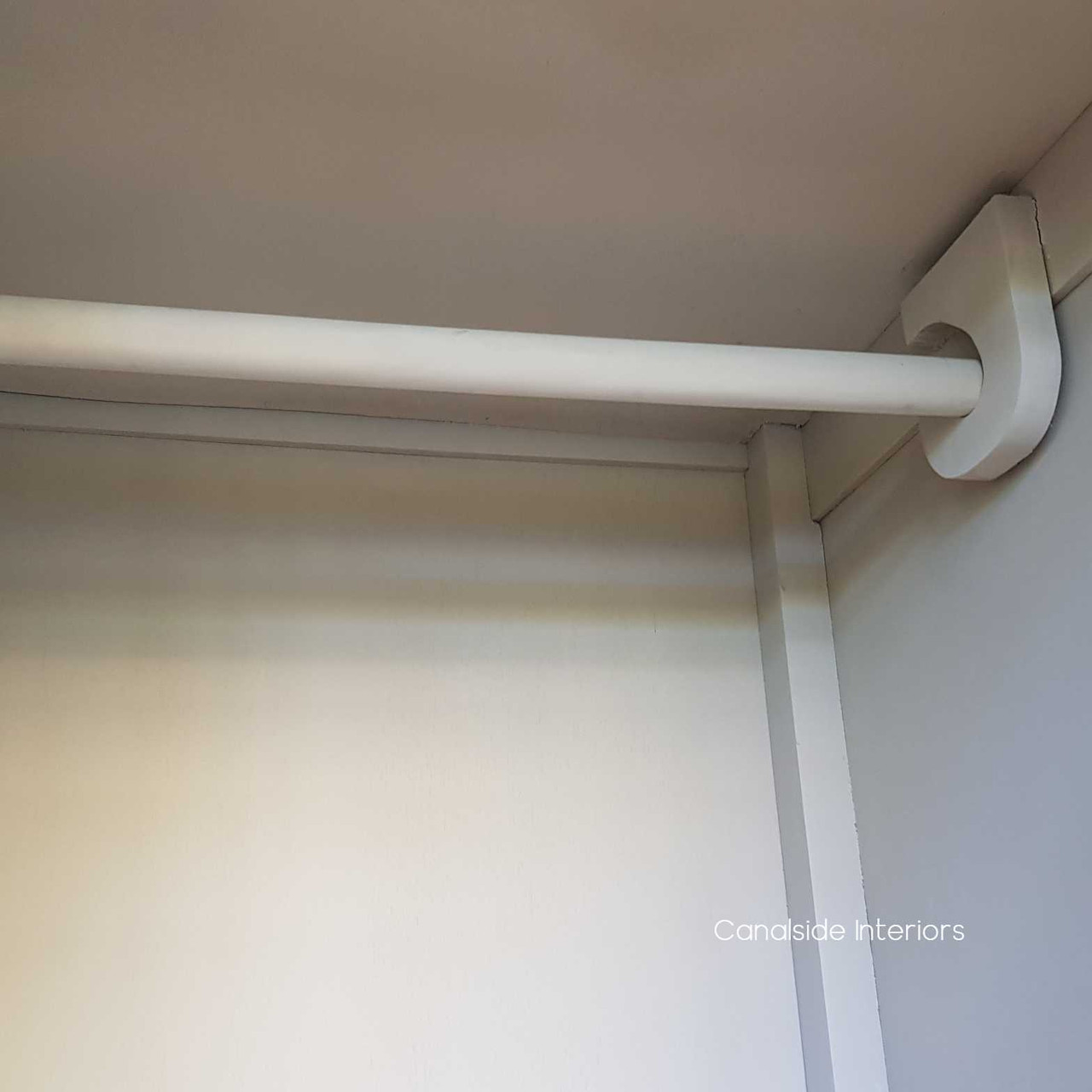 Detail shot of the distressed stone finish, emphasizing the wardrobe's rustic yet refined appeal, perfect for modern homes.