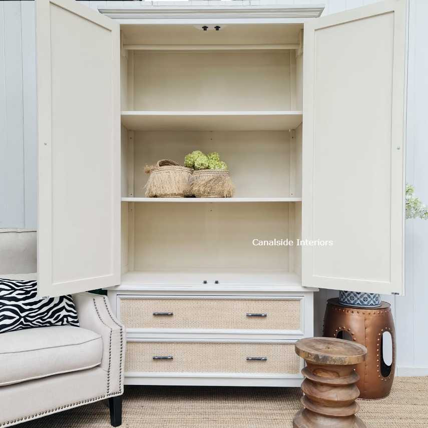 Detail of the wardrobe's spacious interior, designed for effective organization of clothes, accessories, or home essentials.