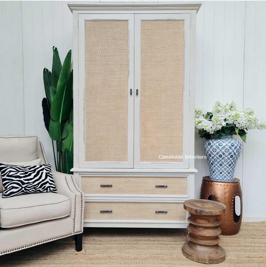 In a living room, the wardrobe serves as a sophisticated storage solution, demonstrating its adaptability beyond bedroom use