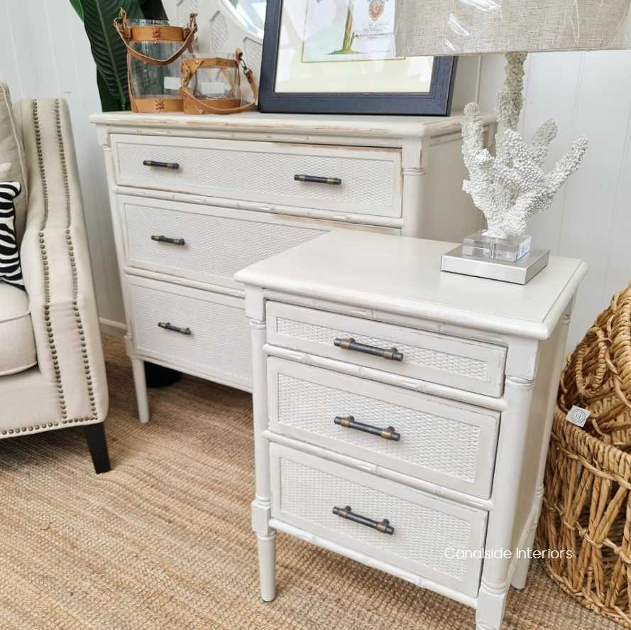 The Brielle Rattan Chest, with its distressed finish, exudes a timeless coastal vibe, making it a versatile piece for any dining room setting - Canalside Interiors.