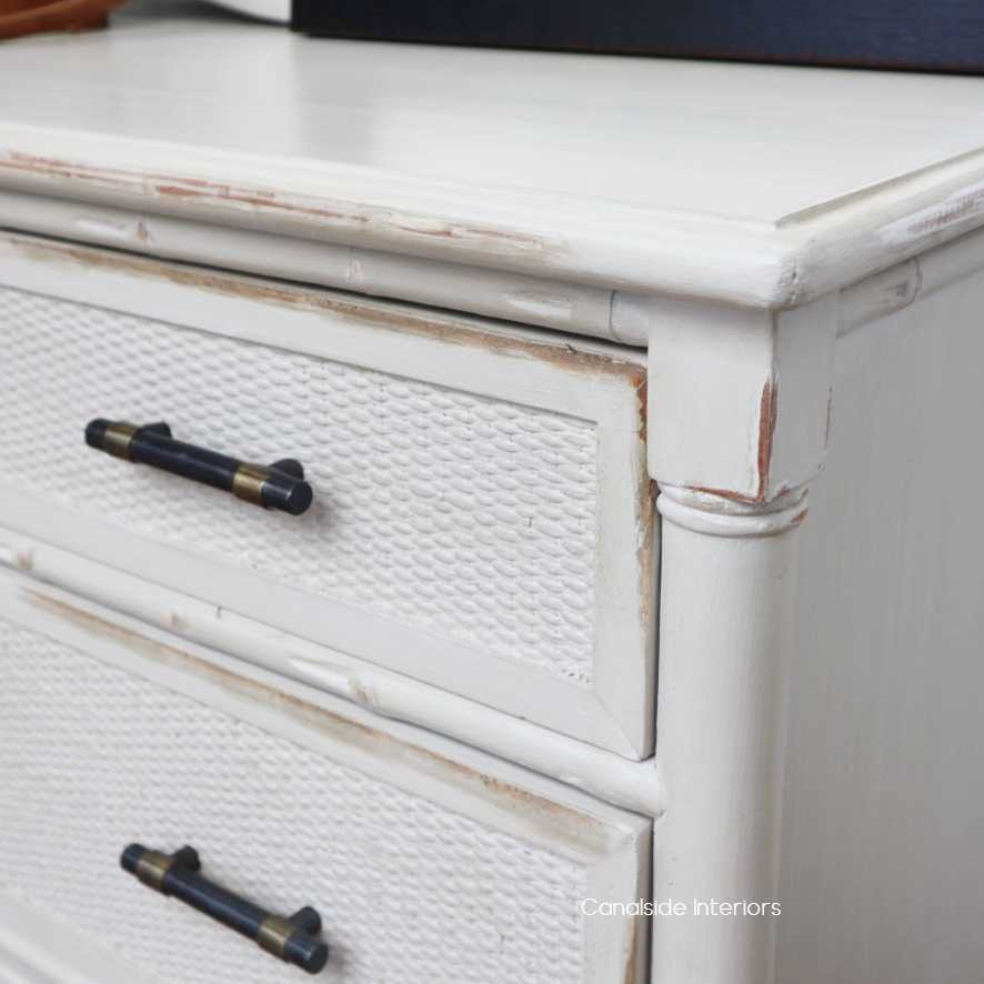 Showcasing coastal elegance, the Brielle Rattan Chest features British Colonial-inspired brass handles and rattan weave detailing, perfect for living room deco