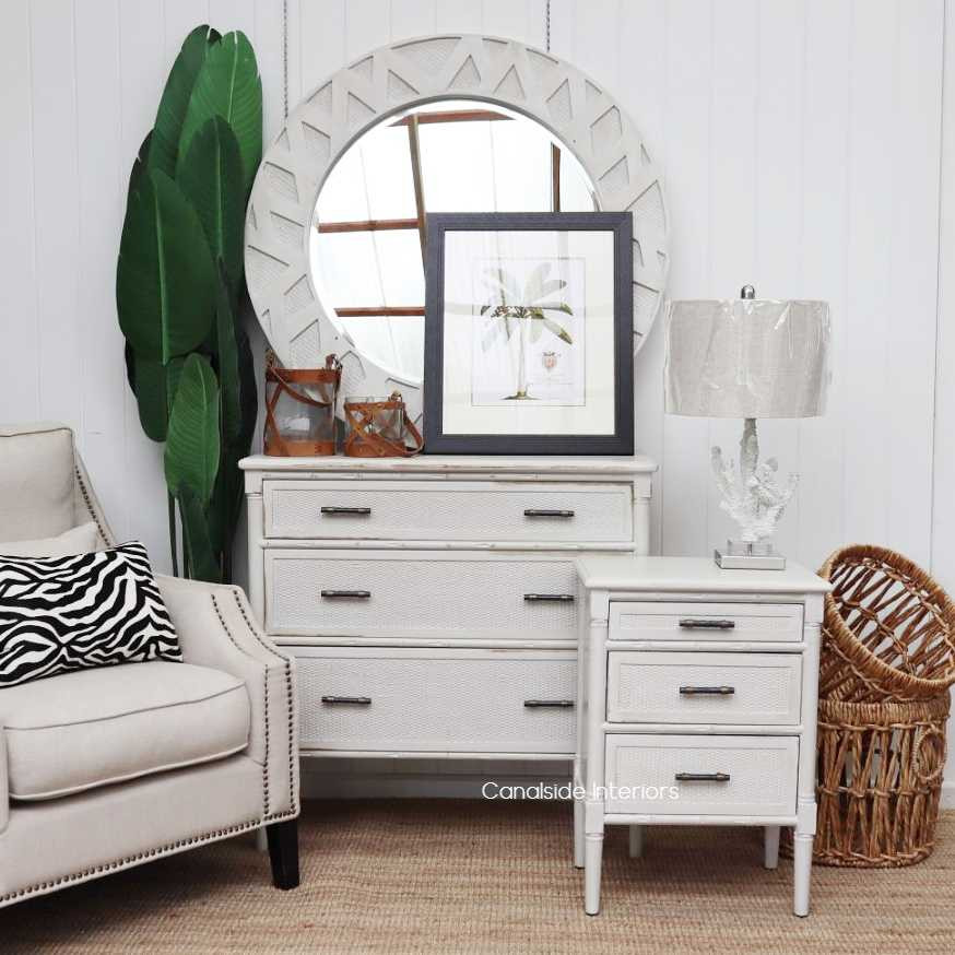 Intricate rattan detailing and stone-hued color of the Brielle Chest by Canalside Interiors make it a luxurious yet practical centerpiece for any lounge room