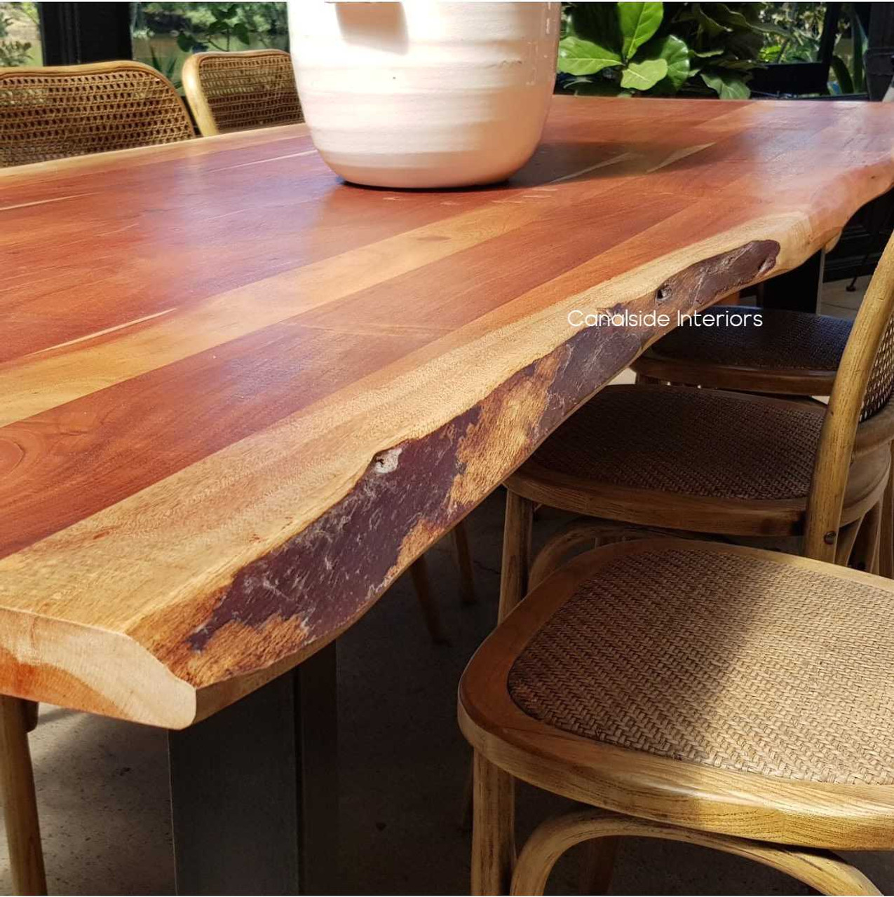 Close-up of the live edge detail, highlighting the organic curves and textures that make each piece uniquely beautiful.