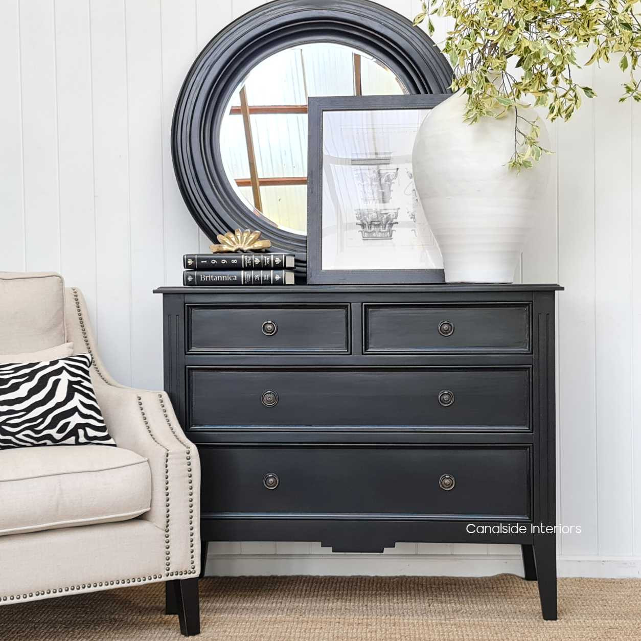 The mirror captured in a well-lit area, showcasing its reflective quality and the timeless design that suits any home style.