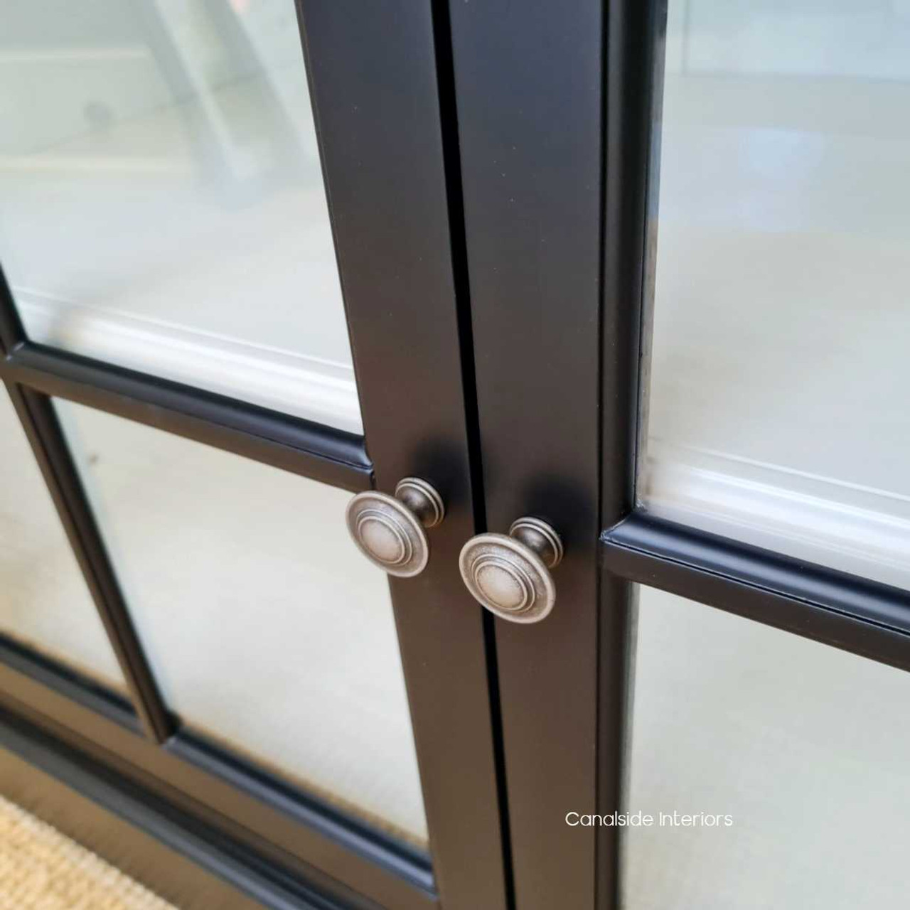 Close-up on the brass handles featured on the Casement TV Sideboard.