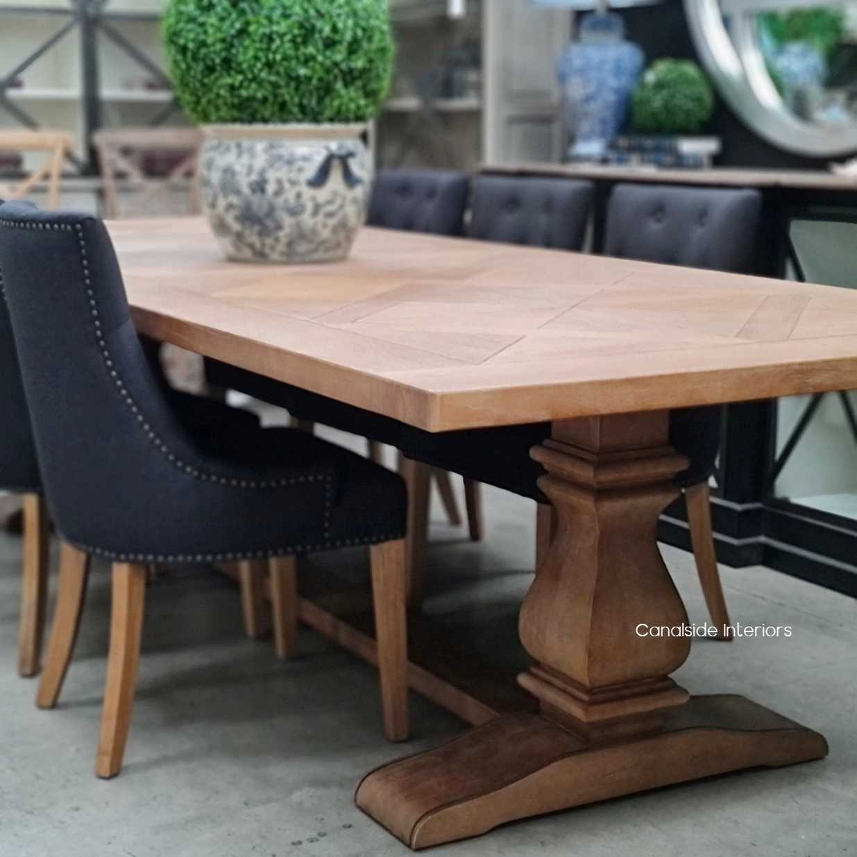 In a minimalist setting, the Hampton Bay Table stands out as a statement piece, bringing warmth and character to contemporary interiors.