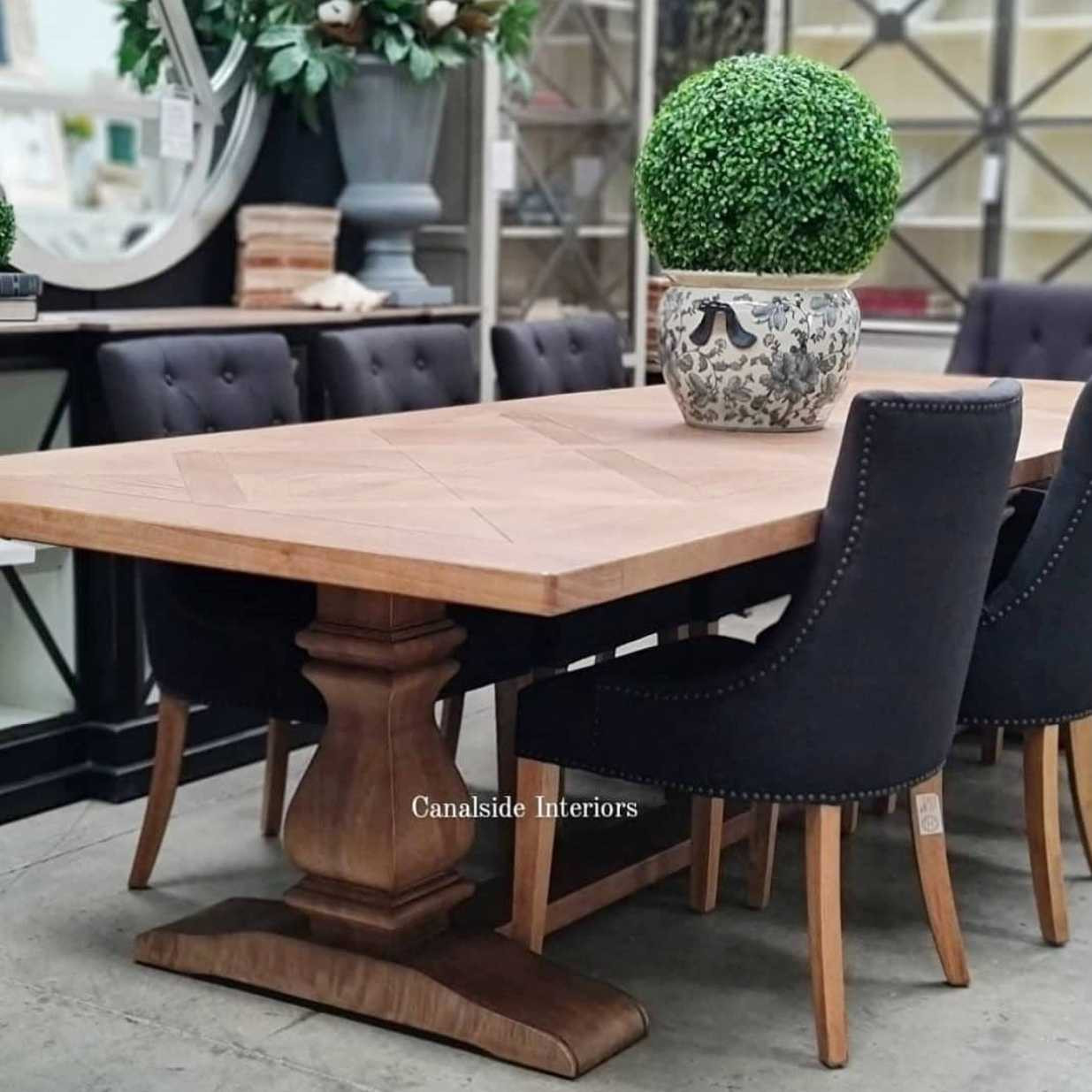 An angled shot of the table, showcasing its ample size that comfortably accommodates large family gatherings, making it perfect for growing families.