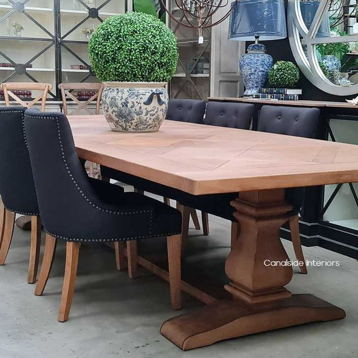 The dining table in a lively family setting, depicting a casual weekend breakfast scene, accentuating its role in everyday family life.