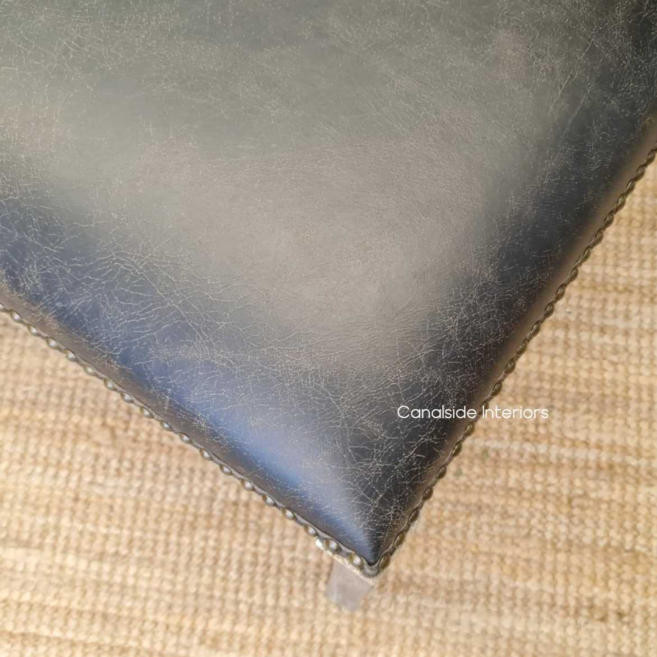 In a cozy home office, the Sainz Dining Chair provides a classic aesthetic with the functionality of modern furnishings