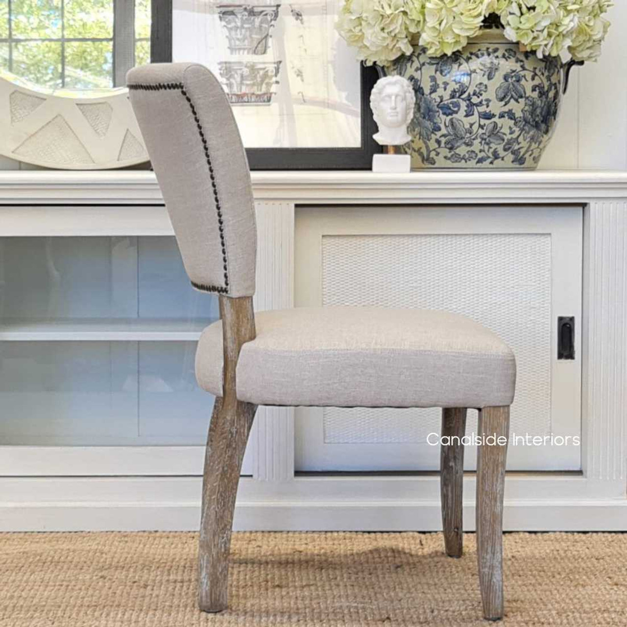Mimi Dining Chair as part of a living room setup, blending seamlessly with both classical and modern decor elements.