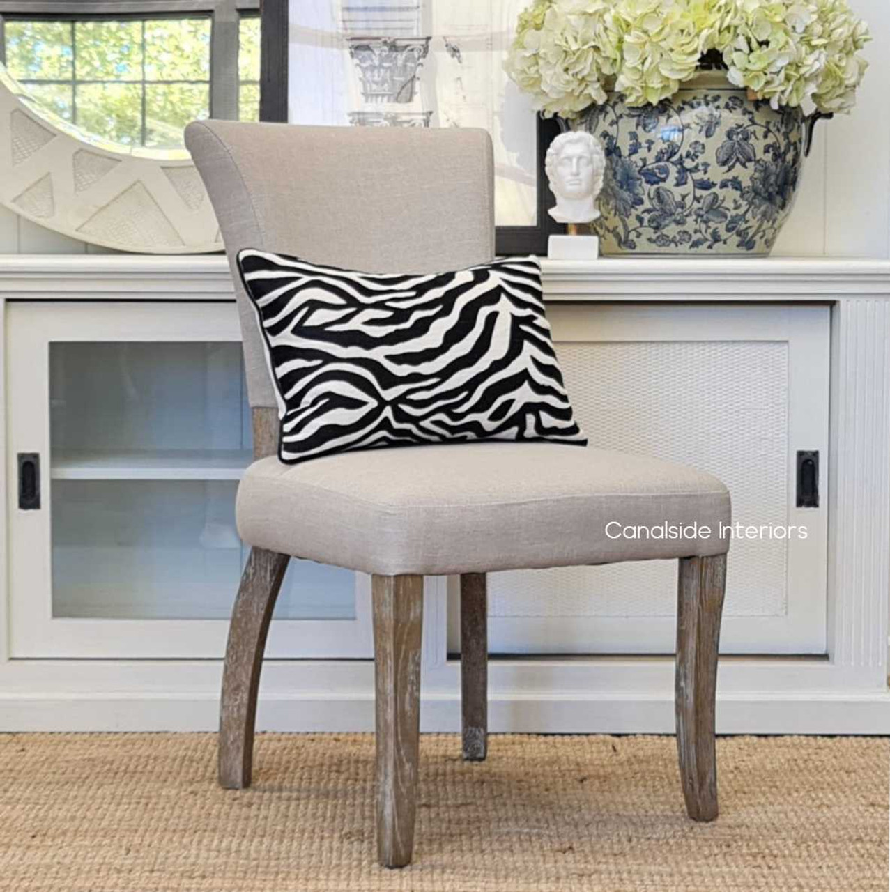 The Mimi Dining Chair paired with a modern decor, highlighting how it bridges the gap between classic and contemporary styles.