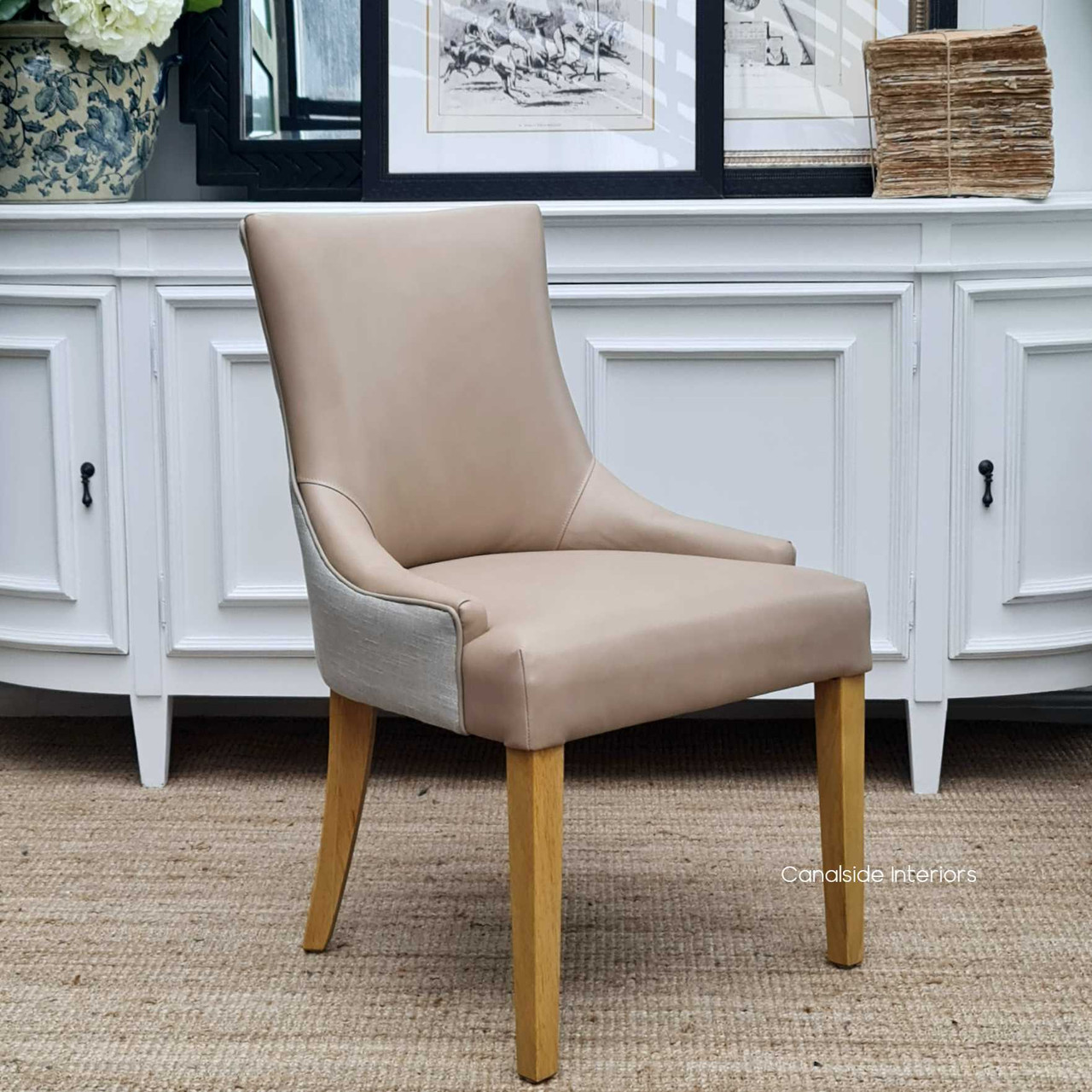 The Aston chair set in a classic Hamptons-style dining room, illustrating its perfect fit within luxurious and coastal-themed decors.