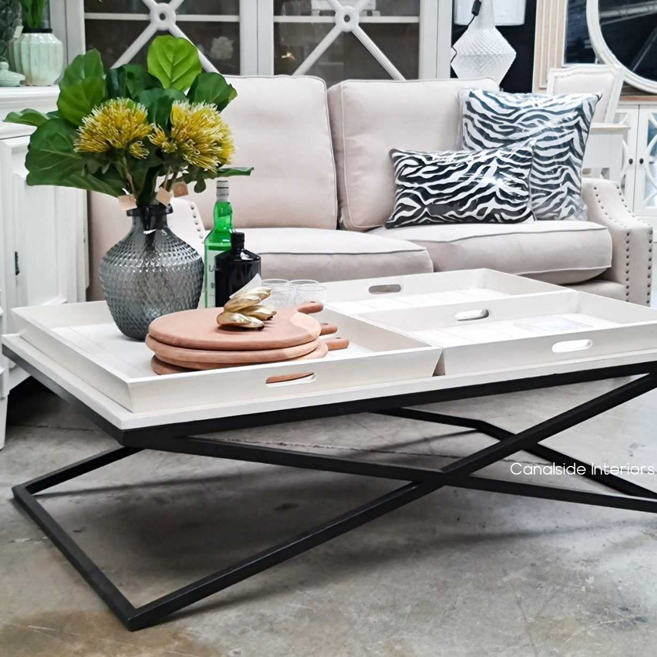 Angled perspective of the Baxter Coffee Table, emphasizing its versatility across decor styles from Classic to Industrial.