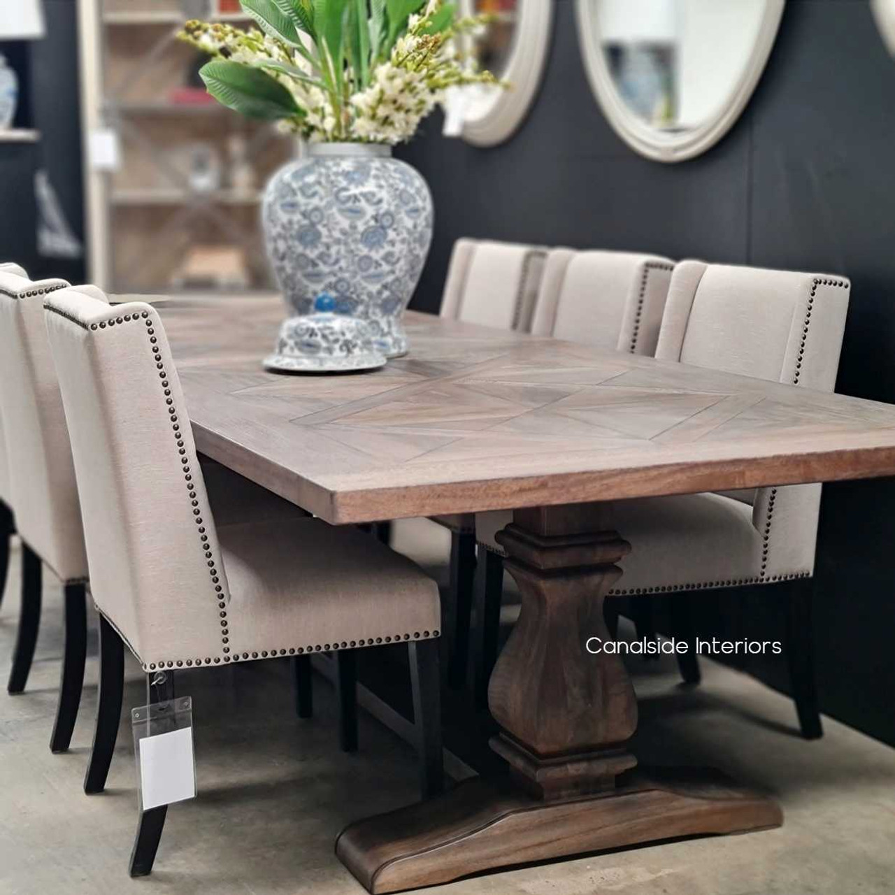 Frontal view of the Bridgehampton Parquetry Dining Table at Canalside Interiors, highlighting its refined hardwood timber finish and intricate parquetry top.