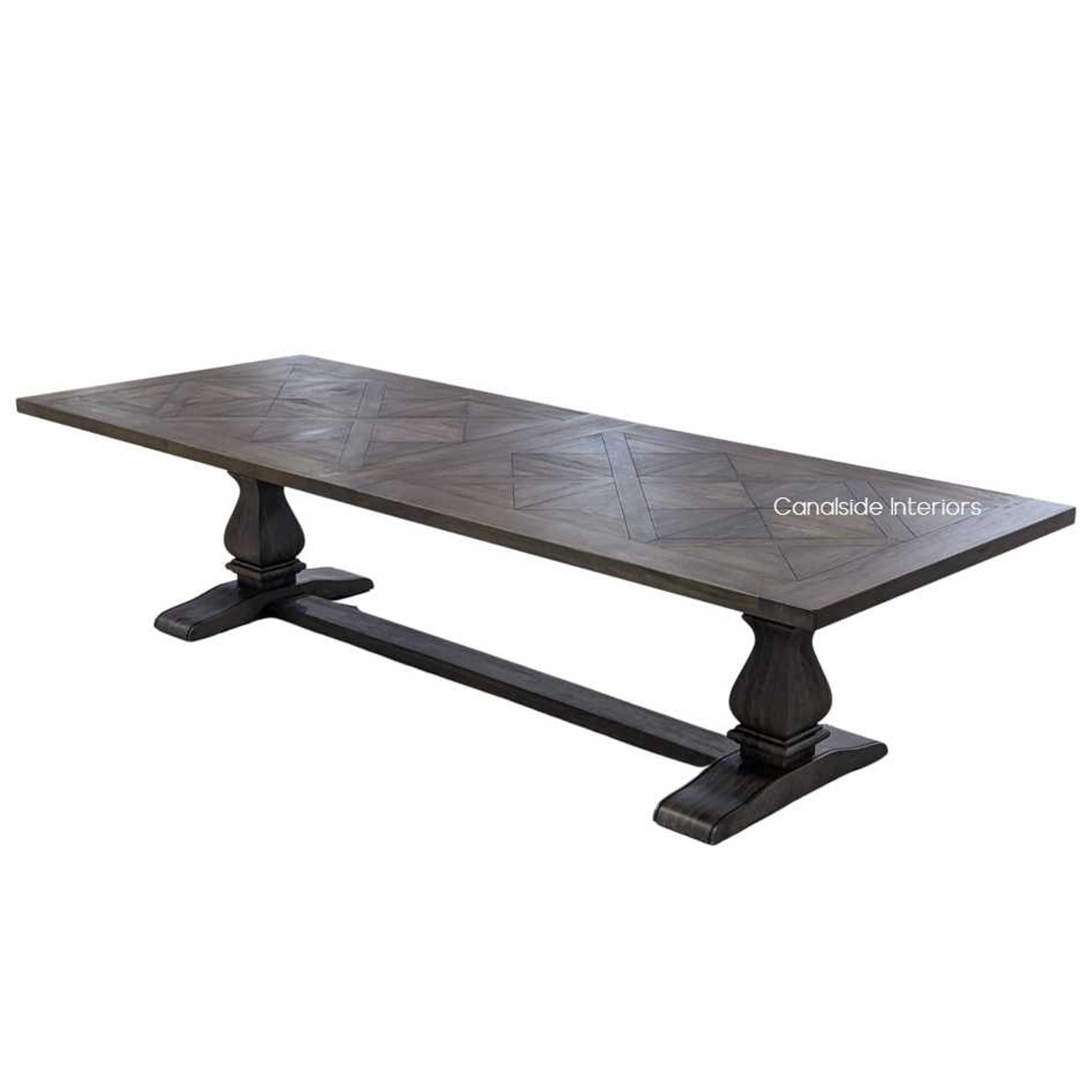 Elevated view capturing the table's overall dimensions, ideal for family gatherings and sophisticated entertaining.