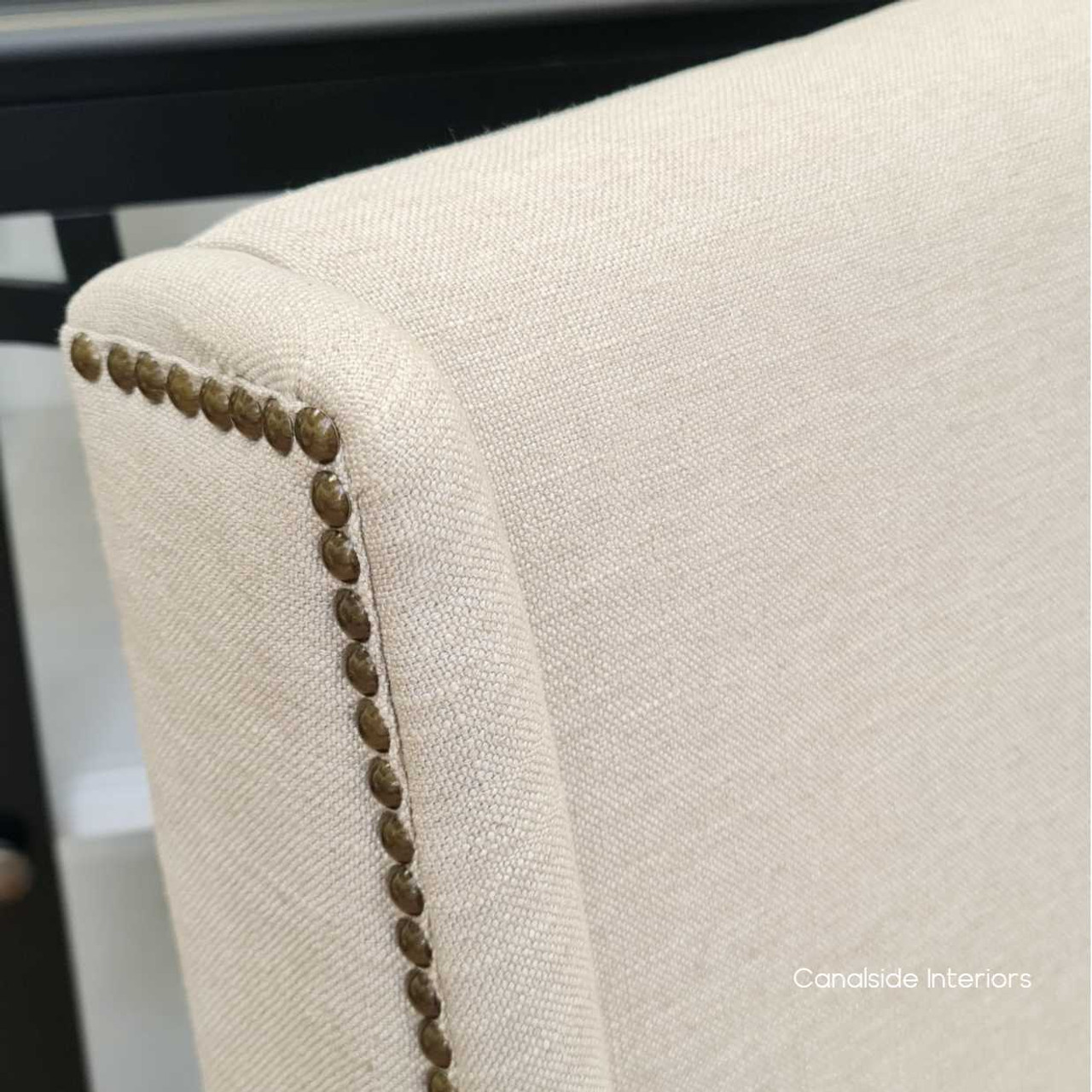 The Leclerc Chair accompanied by Hamptons style furniture, showing how it complements diverse interior styles, from traditional to avant-garde.