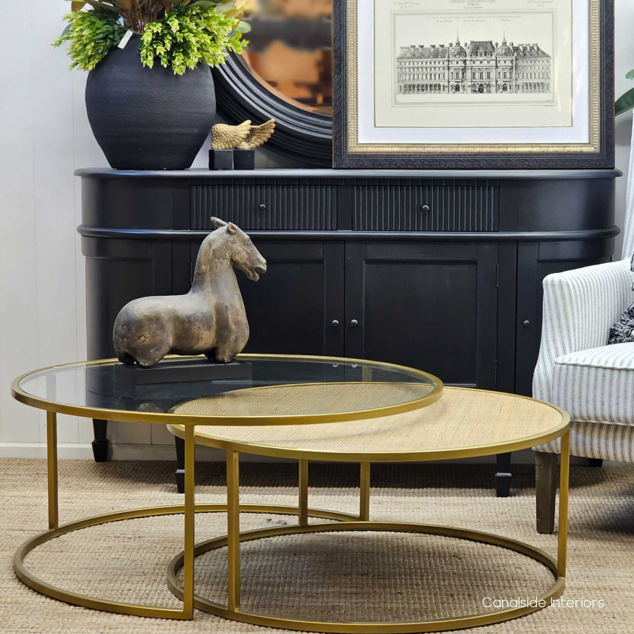 The Knox Plantation Nesting Coffee Tables, with their gold frames and glass top, add modern elegance to your living room – Canalside Interiors