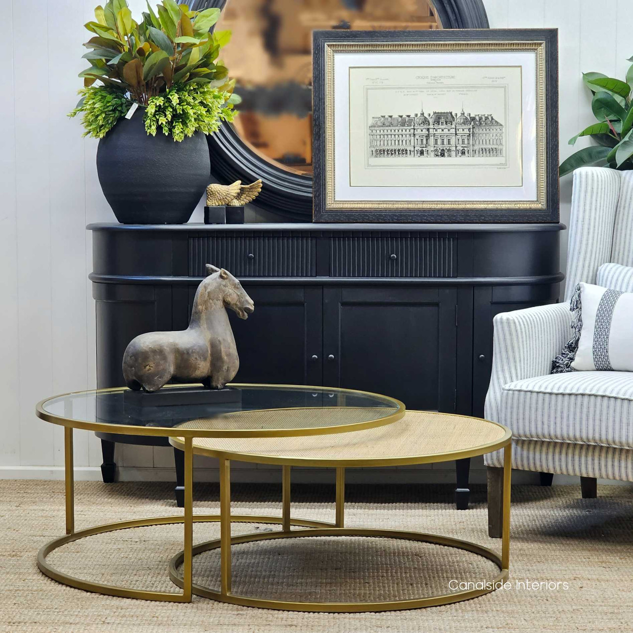 Perfectly blending with coastal themes, the rattan-topped Knox Nesting Table from Canalside Interiors complements a spacious or intimate living area