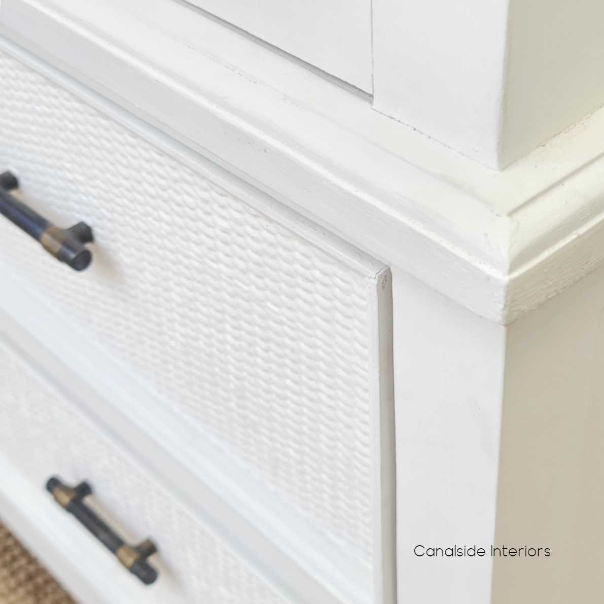 The wardrobe's drawers on metal runners, demonstrating ease of use and additional storage for essentials.
