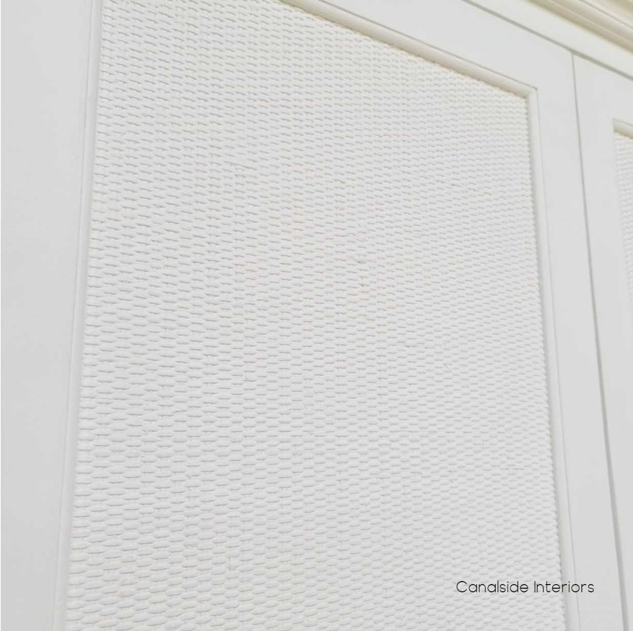 The unit captured in a bright room, showcasing its reflective quality and timeless design complementing any home style.