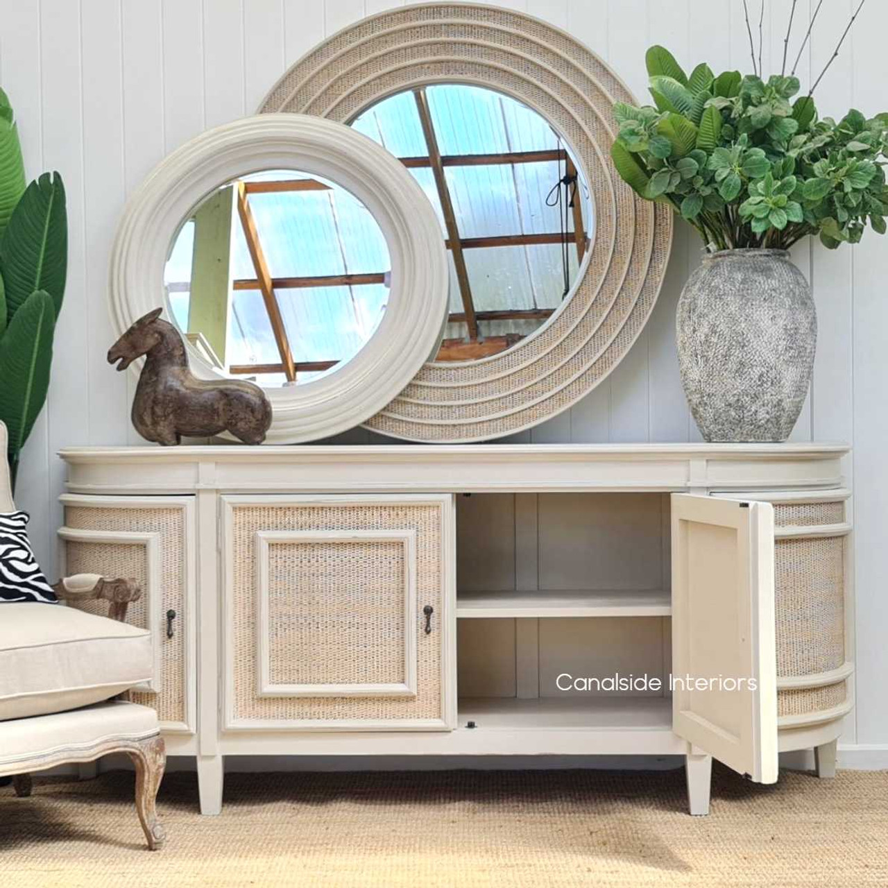 The Francia Rattan Sideboard in distressed stone brings a modern yet timeless storage solution to your home office, crafted by the artisans at Canalside Interiors.