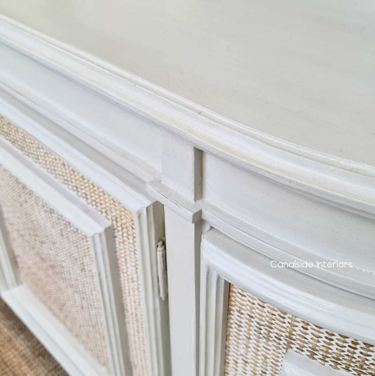 The Francia Stone Rattan Sideboard from Canalside Interiors offers a blend of rustic charm and contemporary finesse, ideal for creating an inviting bedroom retreat