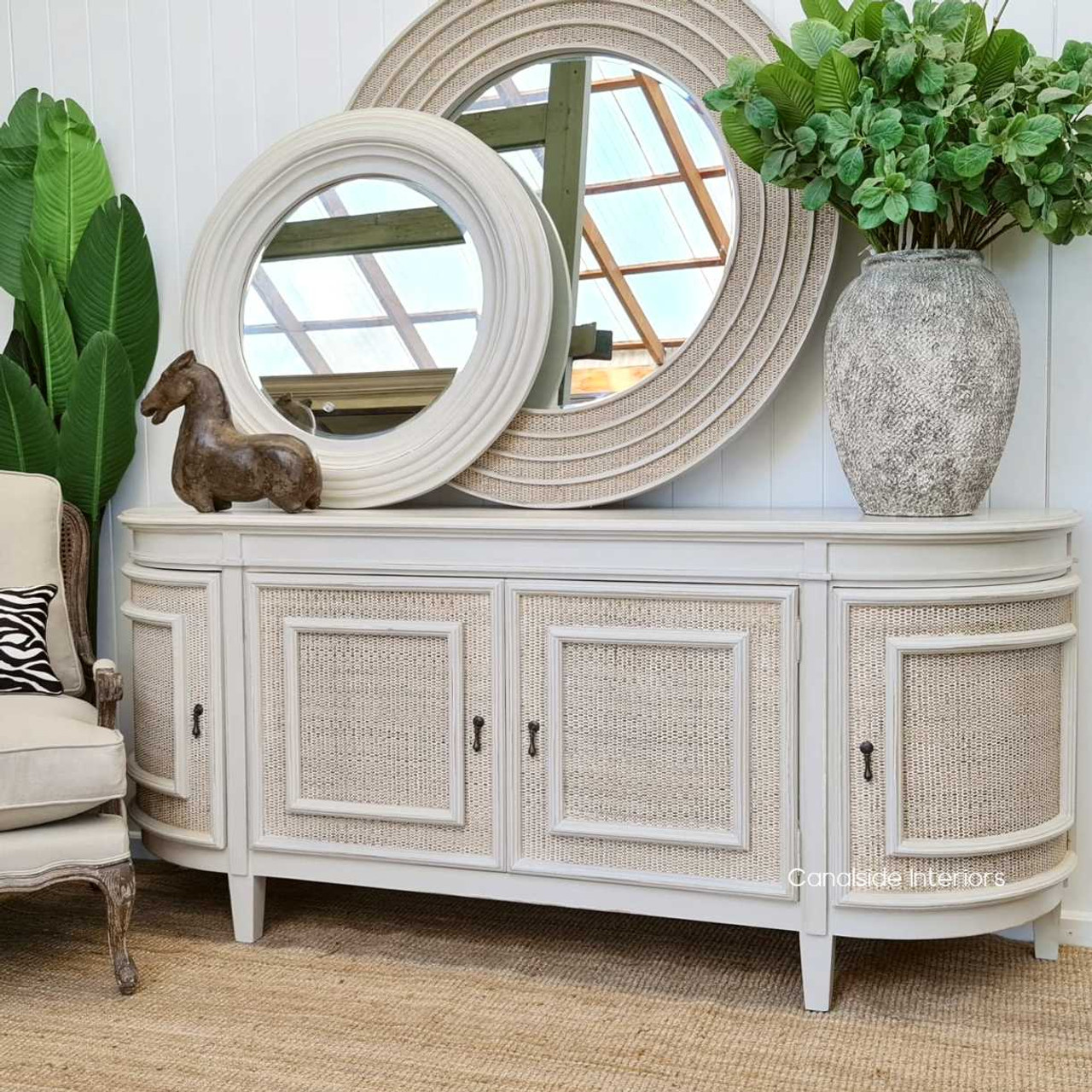Accent your dining area with the natural textures of the stone rattan Francia Sideboard, a Canalside Interiors masterpiece that brings both beauty and utility