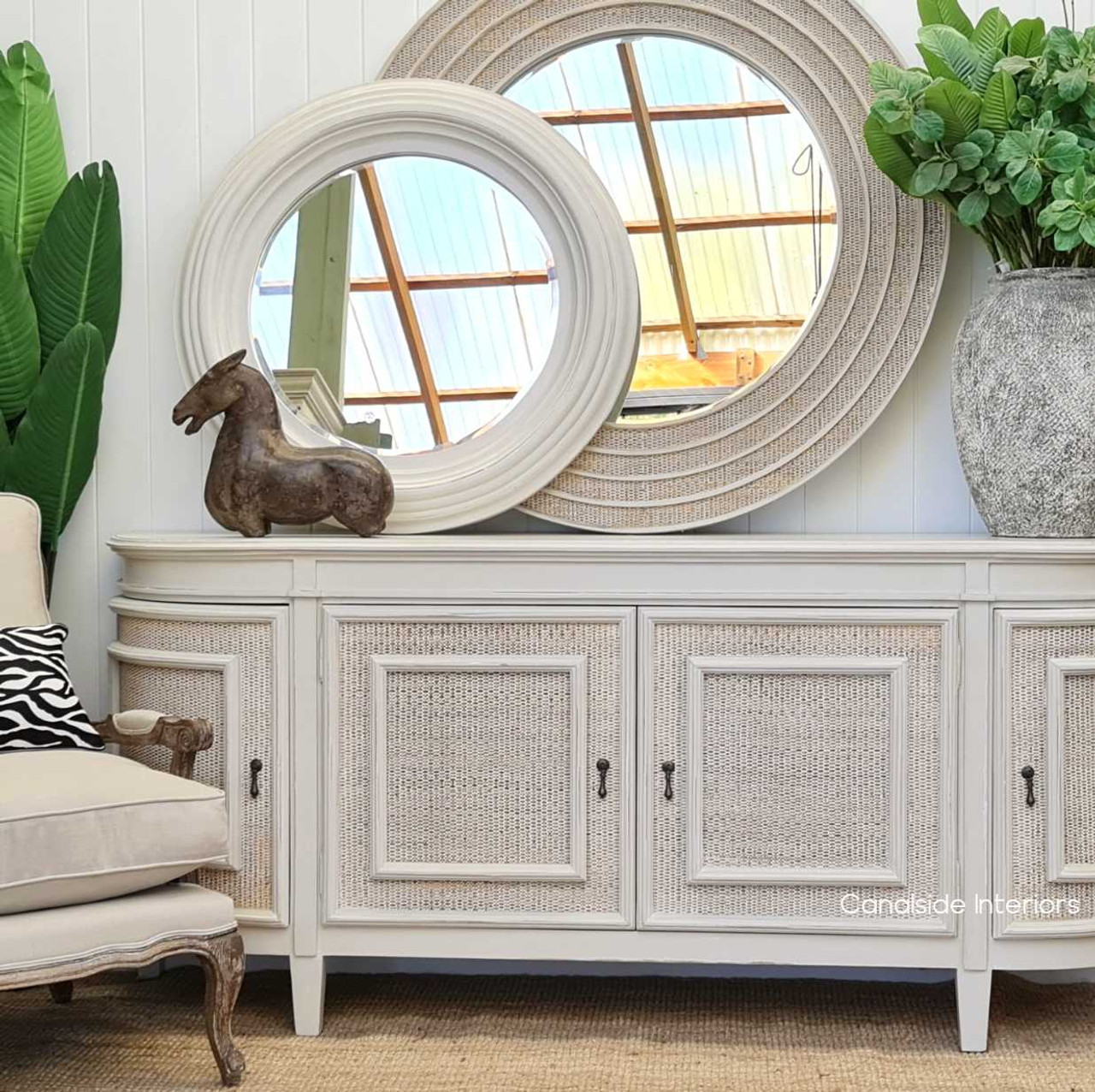 Make dining a grand affair with the spacious and stylish Francia Rattan Sideboard, featuring a distressed stone finish that complements any modern dining room decor
