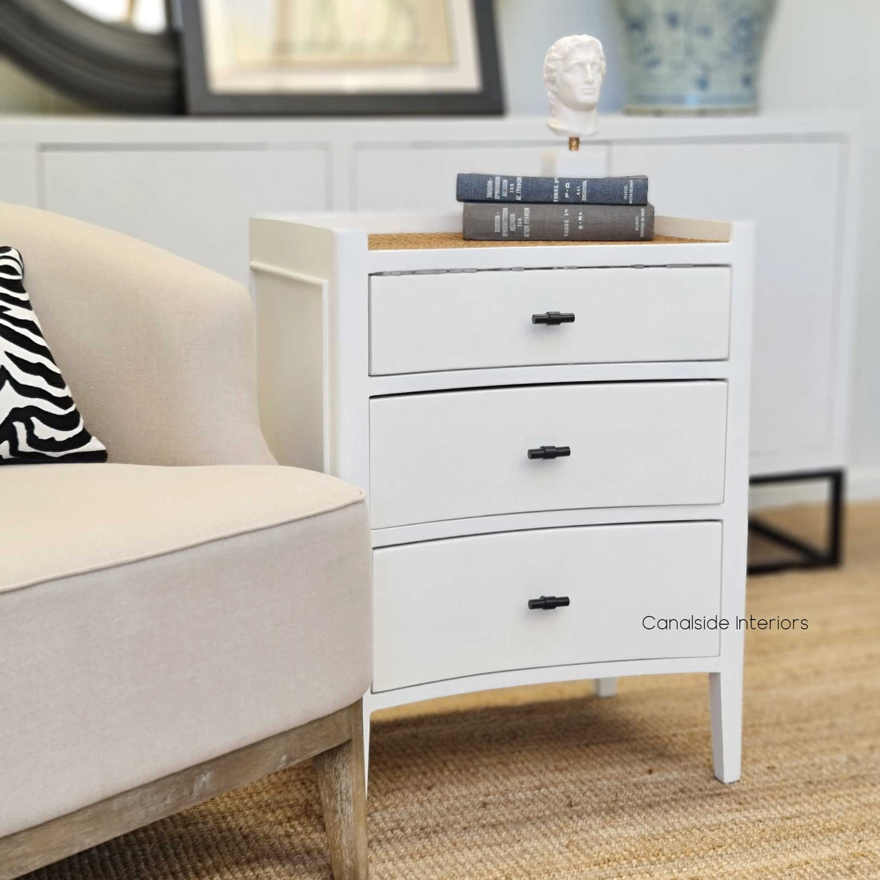 Side perspective of the bedside, capturing its compact size and the versatility that makes it suitable for both small and large spaces.