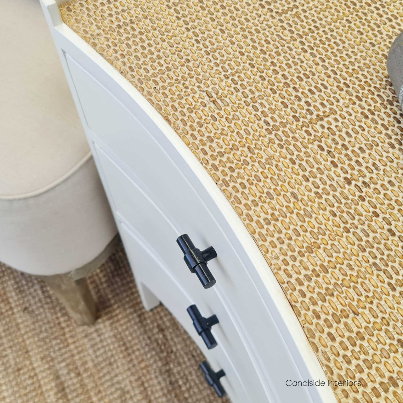 Close-up of the rattan top texture, highlighting the natural beauty and craftsmanship that complements any bedroom decor.