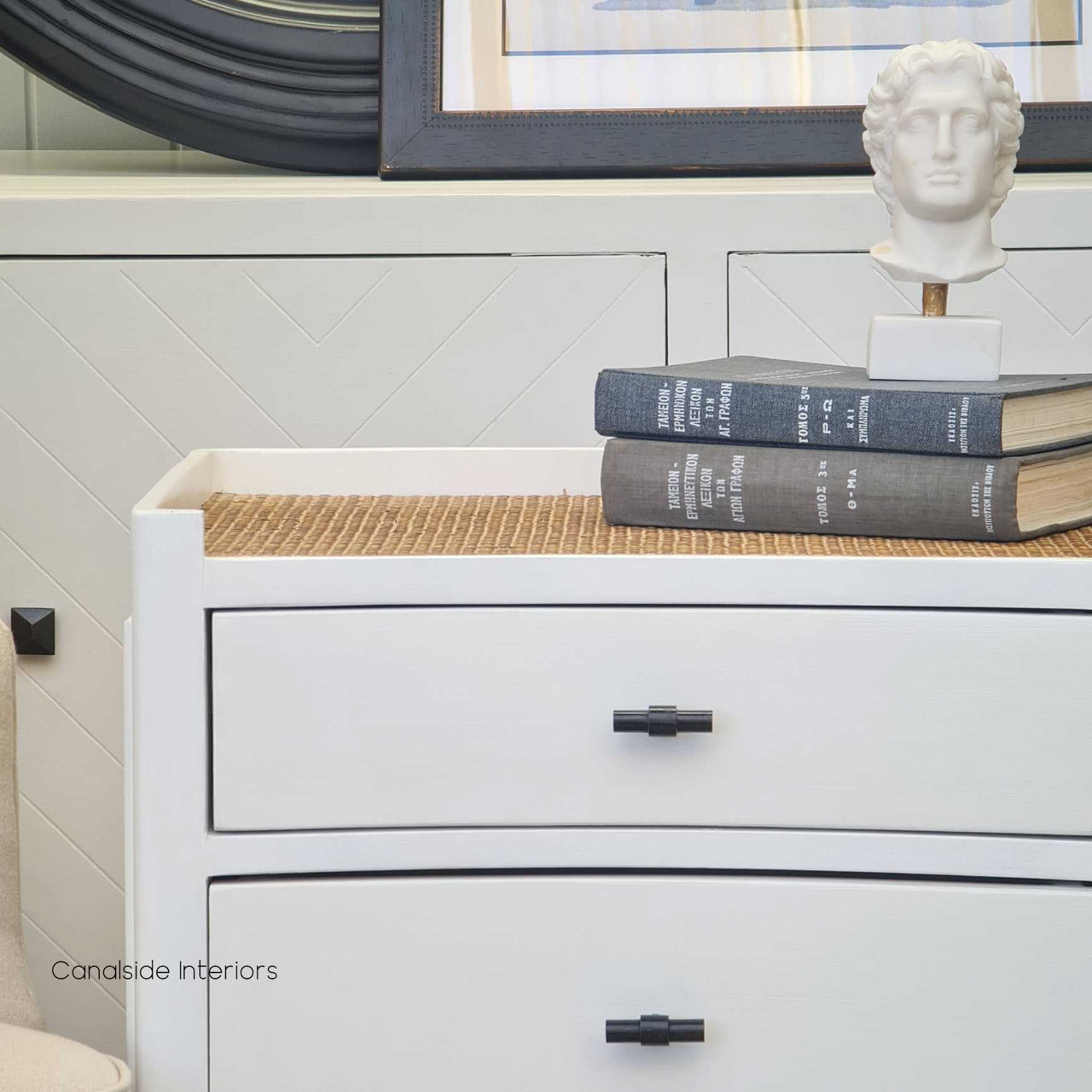 Detail shot of the distressed white finish, showcasing the attention to detail and the chic, timeless appeal of the bedside.