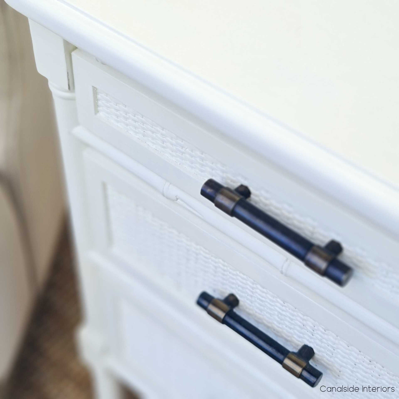 More than just a bedside table! The Brielle Rattan Bedside in Distressed White adds timeless elegance and functionality to any bedroom.