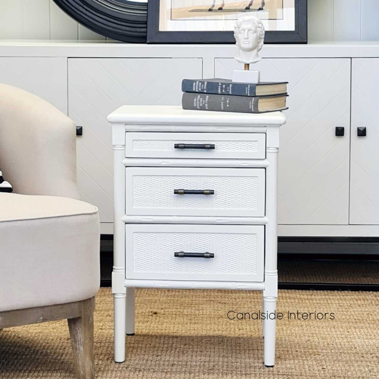 The Brielle Rattan Bedside's three drawers offer versatile storage for bedroom essentials, keeping your Hamptons or coastal space clutter-free.