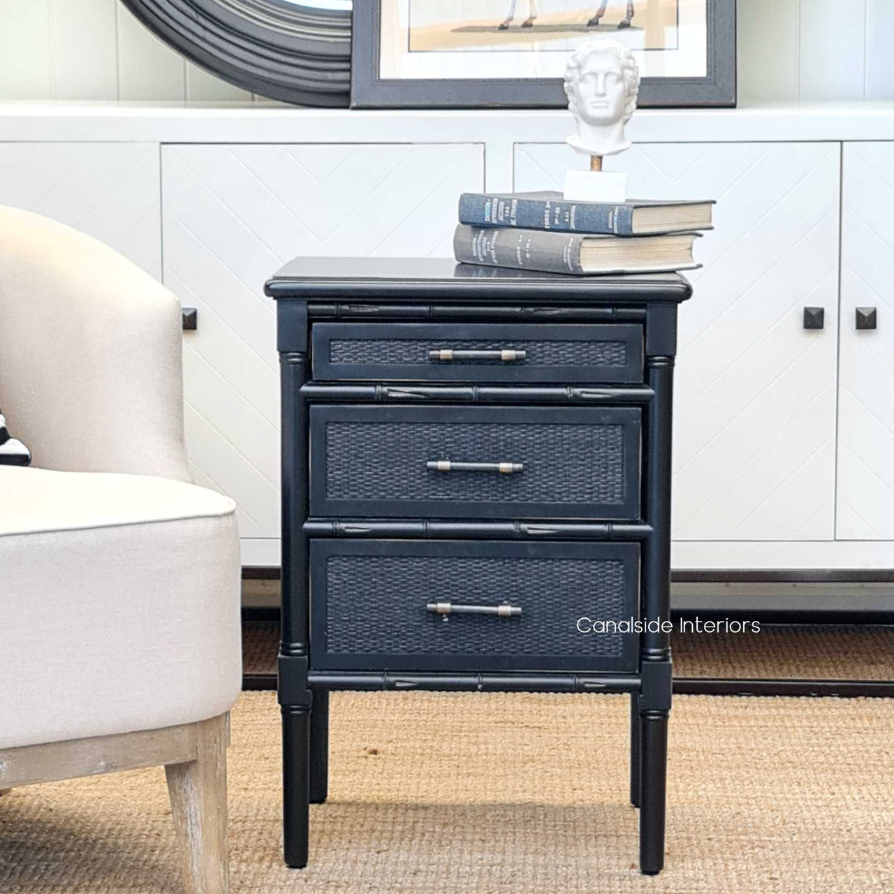 Distressed charcoal black Brielle Rattan Bedside with three drawers, perfect for bedrooms seeking Hamptons or coastal style.