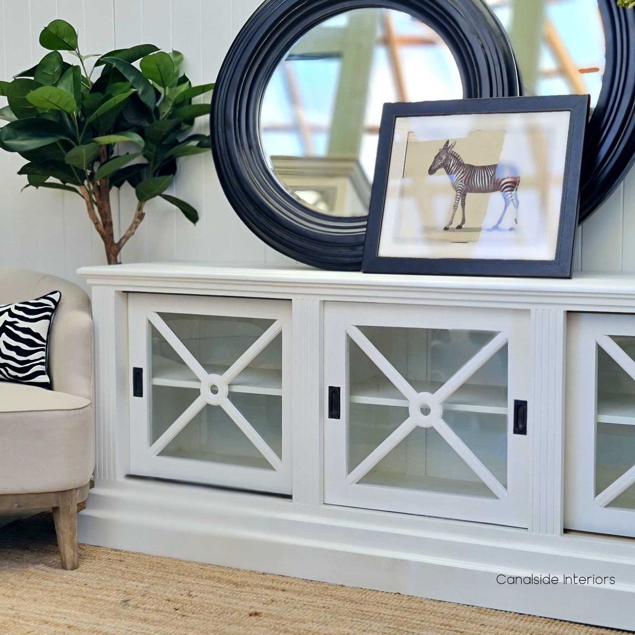 Angled perspective showing the depth and storage capacity of the sideboard, perfect for organizing media components.