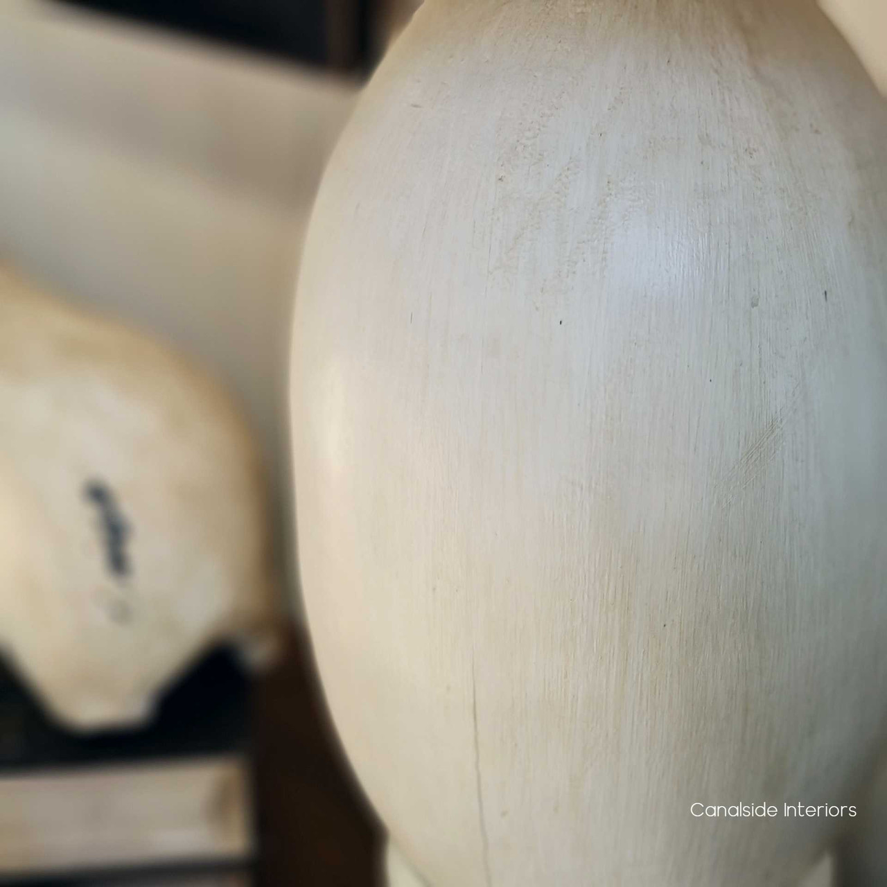 The Clemence Lamp from Canalside Interiors, dressed in an elegant black, brings a classical and timeless feel to your library