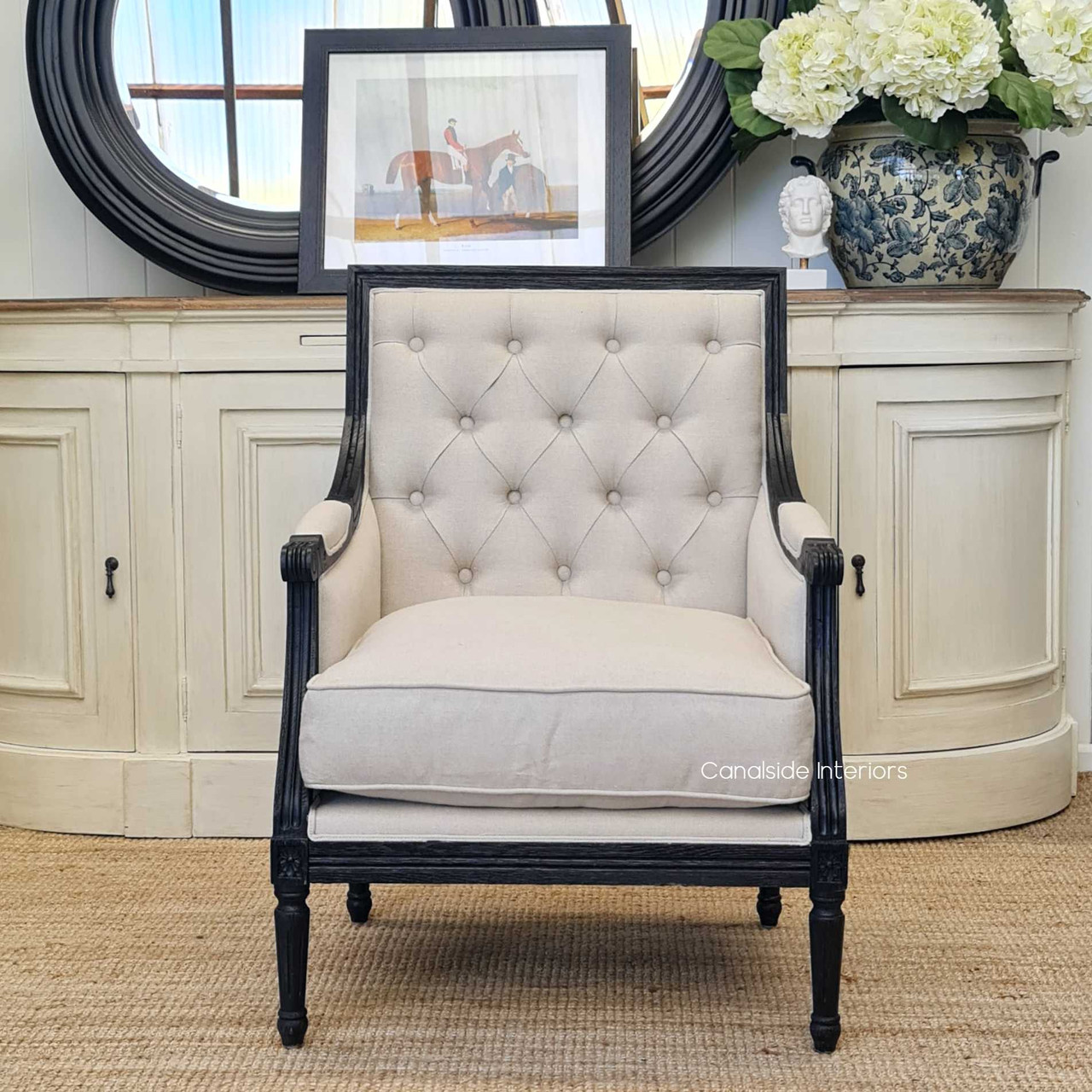 Lifestyle scene with the Pearson Armchair in a Hamptons-inspired interior, exuding coastal elegance and relaxed luxury.