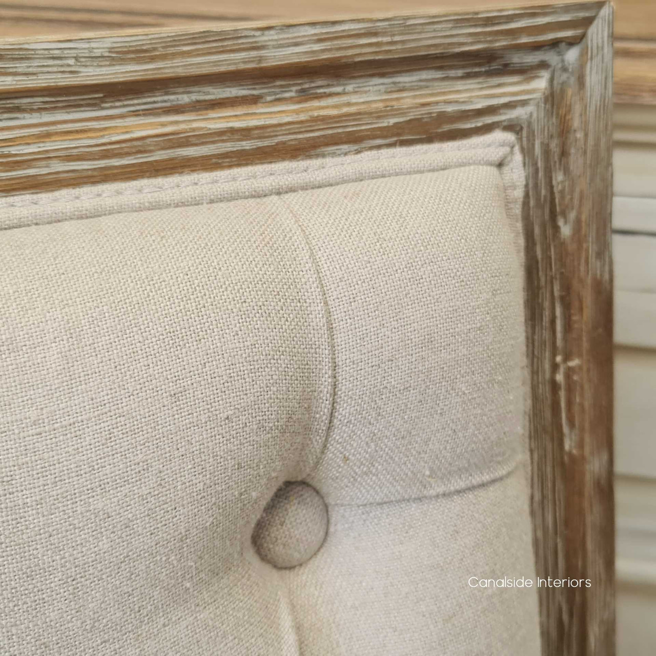 Cream linen upholstery close-up, emphasizing the texture and quality of the Pearson Range.