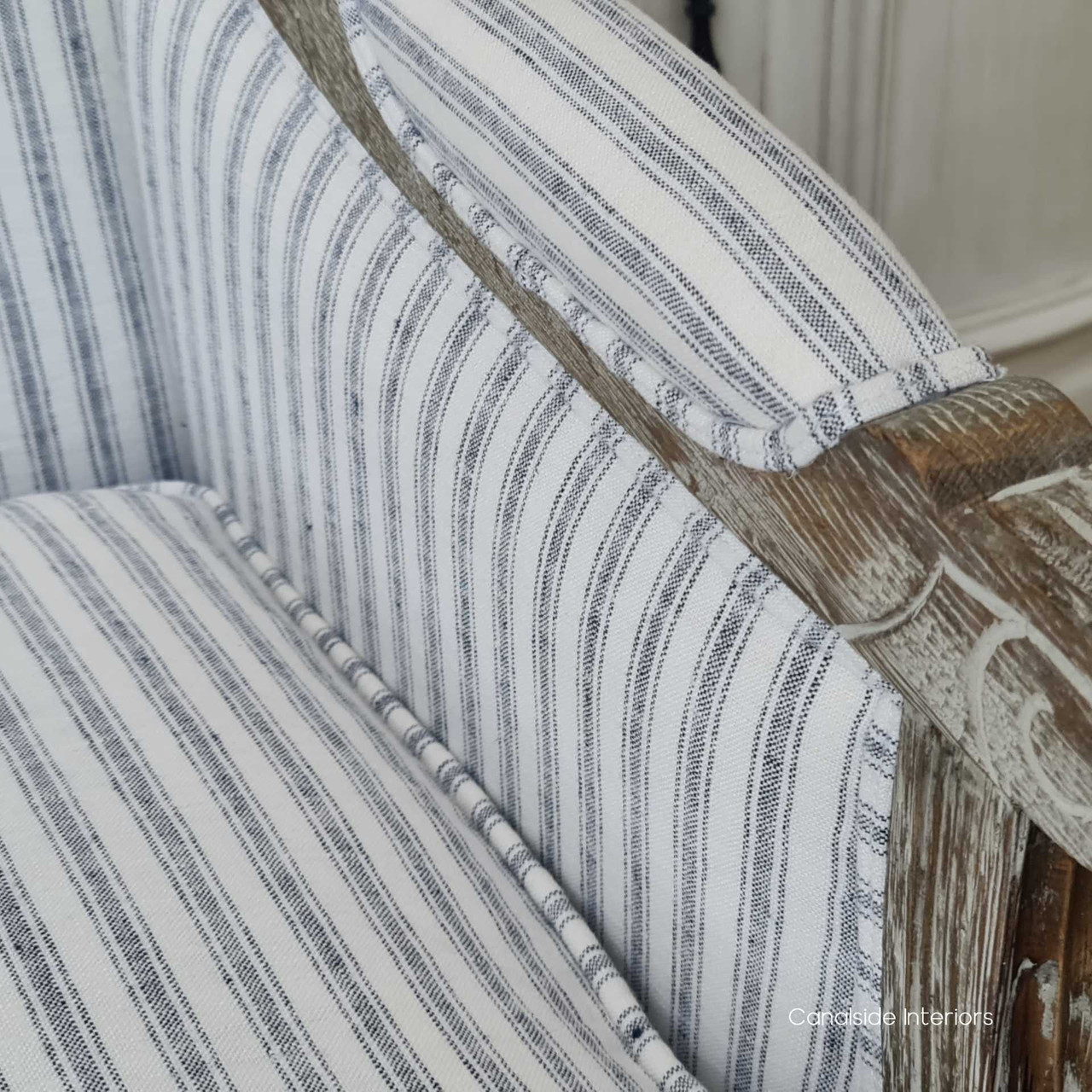 Lifestyle image: The Pearson Armchair enriching a dining room, offering stylish and comfortable seating for guests.