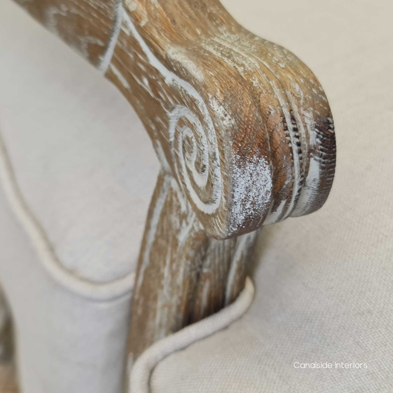 Close-up on the weathered oak frame, showcasing the exquisite craftsmanship and fine detailing.